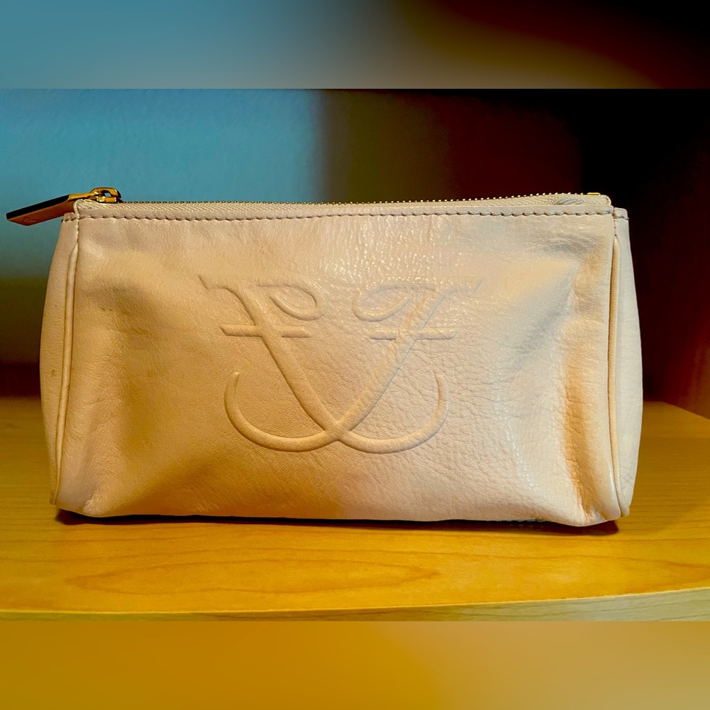 Frette Leather makeup bag in pale pink.